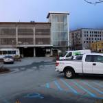 The Shopper’s Lot is among two of downtown Juneau’s three per-hour parking lots where the cash payments boxes are missing due to vandalism this winter. But as of Wednesday people can use the free ParkSmarter app to make payments by phone. (Mark Sabbatini / Juneau Empire)