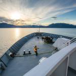 An employee works on the deck of an Alaska Marine Highway System vessel in a photo used by AMHS on social media to advertise jobs openings during the summer of 2023. (Alaska Department of Transportation and Public Facilities photo)