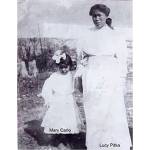 In this photo believed taken in 1925, Lucille Pitka McCormick, right, is shown with her daughter Mary Carlo in the village of Rampart, Alaska. McCormick was one of the Lost Alaskans sent to a mental hospital in the 1930s. Her grave was recently discovered, and family members brought her back to Alaska for a proper burial. (Photo by Wally Carlo via AP).