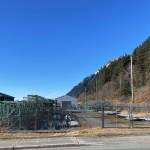 A fenced lot being proposed as a campsite for people experiencing homelessness is located next to the citys cold weather emergency shelter, in the background. Owners of nearby businesses are opposing the campground, stating there were thefts, vandalism and other problems by people staying at the shelter during the winter. (Photo by Laurie Craig)