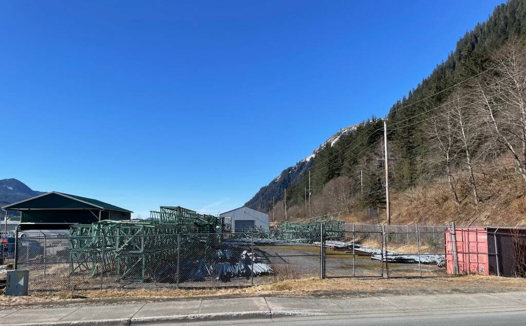 A fenced lot being proposed as a campsite for people experiencing homelessness is located next to the citys cold weather emergency shelter, in the background. Owners of nearby businesses are opposing the campground, stating there were thefts, vandalism and other problems by people staying at the shelter during the winter. (Photo by Laurie Craig)
