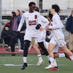Ahmir Parker (9) celebrates after scoring the fourth and final goal for Juneau-Douglas High School: Yadaa.at Kalé during Tuesdays game against Thunder Mountain High School at TMHS. (Mark Sabbatini / Juneau Empire)