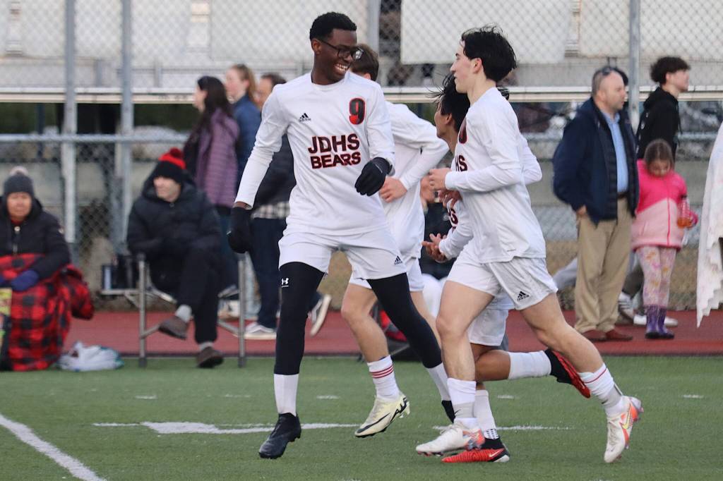 Ahmir Parker (9) celebrates after scoring the fourth and final goal for Juneau-Douglas High School: Yadaa.at Kalé during Tuesdays game against Thunder Mountain High School at TMHS. (Mark Sabbatini / Juneau Empire)