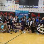 Members of about 30 student and adult teams greet each other while entering the gymnasium at Juneau-Douglas High School: Yadaa.at Kalé during the opening ceremony of the Traditional Games on Saturday. (Mark Sabbatini / Juneau Empire)