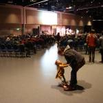 Becca Antonoplos dances with her daughter, Mackovia Rohrbacher, 2, in the rear of the main ballroom at Centennial Hall during the opening night of the 49th annual Alaska Folk Festival on Monday. (Mark Sabbatini/Juneau Empire)