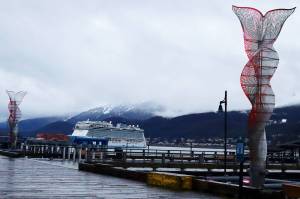 The 1,094-foot-long Norwegian Bliss docks in Juneau early Tuesday morning to begin this years cruise ship season. (Mark Sabbatini / Juneau Empire)