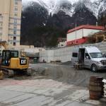 Construction workers work on retaining walls and other infrastructure Tuesday in preparation for an expanded three-season food court on South Franklin Street. The Juneau Planning Commission unanimously approved a conditional use permit for the project, some of which occupies the space where the historic Elks Lodge stood until it was demolished last year. (Mark Sabbatini / Juneau Empire)