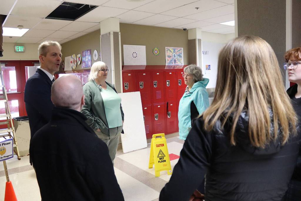 Juneau School District Frank Hauser explains the layout of Floyd Dryden Middle School during a tour on Tuesday, April 2. (Mark Sabbatini / Juneau Empire)