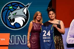 Utahs Alissa Pili, right, poses for a photo with WNBA commissioner Cathy Engelbert after being selected eighth overall by the Minnesota Lynx during the first round of the WNBA basketball draft on Monday in New York. (AP Photo/Adam Hunger)