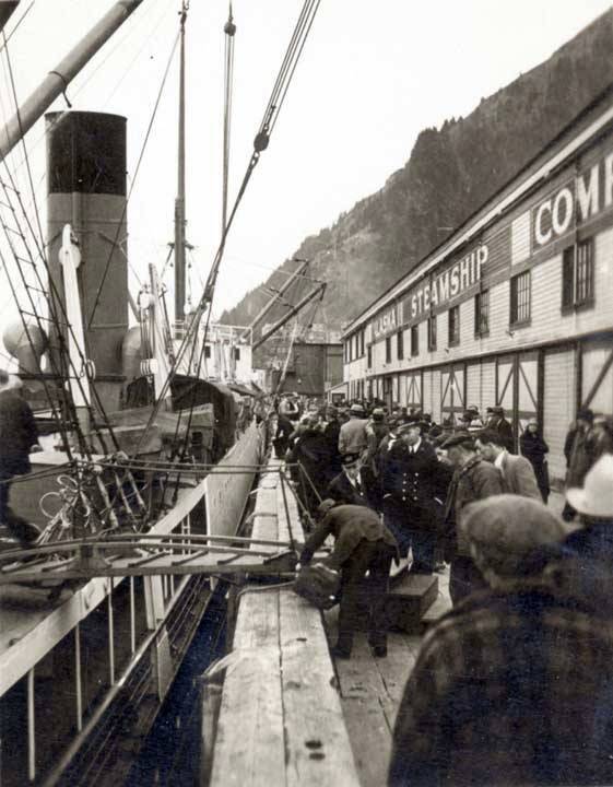 A bustling scene on the Alaska Steamship Company dock in the 1930s. (ASL-P359-015)