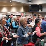Delegates offer prayers during the Central Council of the Tlingit and Haida Indian Tribes of Alaskas 89th Annual Tribal Assembly on Thursday at Elizabeth Peratrovich Hall. (Muriel Reid / Central Council of Tlingit and Haida Indian Tribes of Alaska)