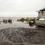 High water laps at the Kivalina shoreline in 2012. The Inupiat community on the Chukchi Sea coast is battered by erosion, storm surges and other effects of climate change. A relocation plan is in the works. (Photo provided by Alaska Division of Community and Regional Affairs)
