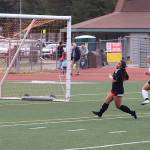Milina Mazon scores one of her three goals for Juneau-Douglas High School: Yadaa.at Kalé during Mondays game against Thunder Mountain High School at Adair-Kennedy Field. (Mark Sabbatini / Juneau Empire)