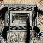 A woven smartphone bag by Rae Mill, an apprentice of Lily Hope for the Youth Pride Robe project. (Photo courtesy of Lily Hope)