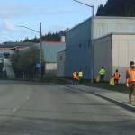 Members of the International Brotherhood of Electrical Workers Local 1547 pick up trash along Egan Drive during the annual Litter Free community cleanup on Saturday morning. (Mark Sabbatini / Juneau Empire)