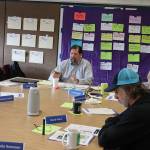 Lon Garrison (center), executive director of the Alaska Association of School Boards, presides over a Juneau Board of Education self-assessment retreat Saturday at Dzantiki Heeni Middle School. (Mark Sabbatini / Juneau Empire)