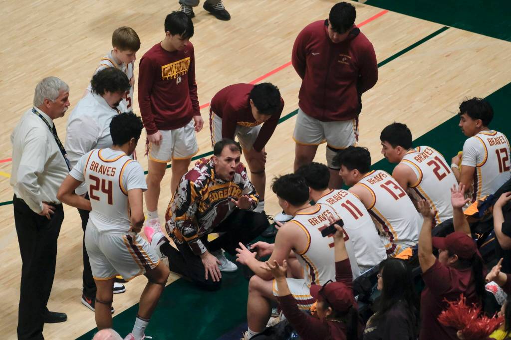 Mt. Edgecumbe High School coach Archie Young instructs Braves players during the 2024 ASAA March Madness Alaska 3A Boys Basketball State Championship game against Nome at Anchorages Alaska Airlines Center. (Photo by Klas Stolpe)