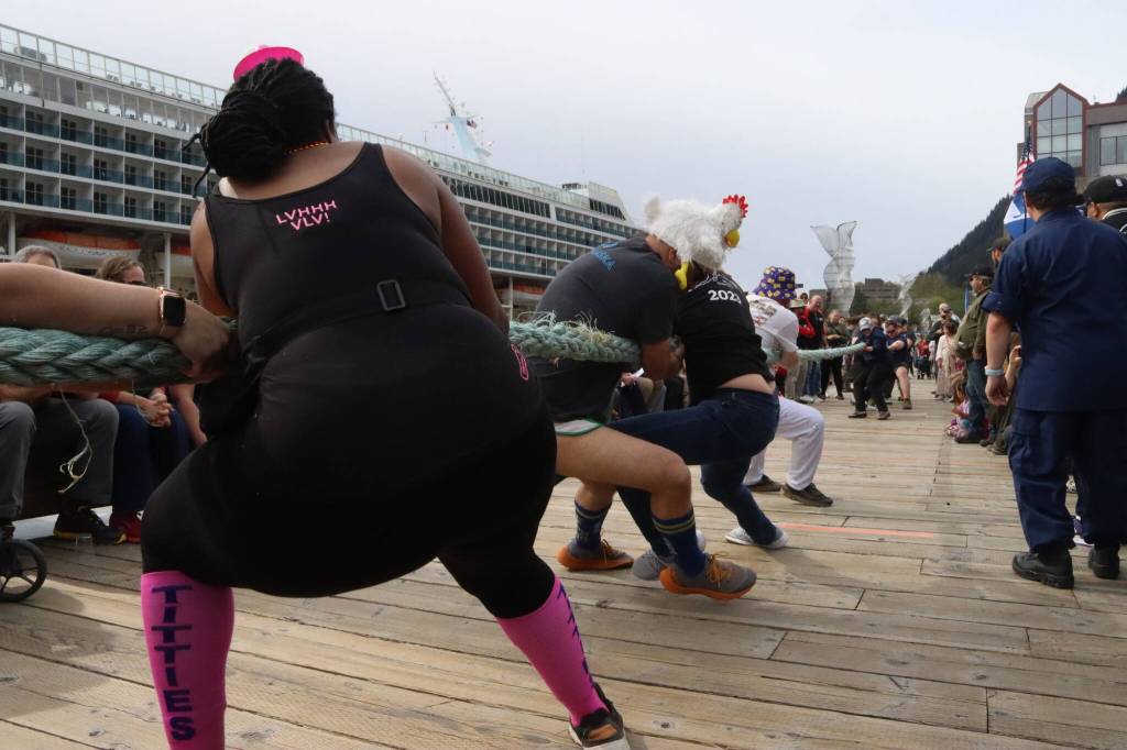 Members of the Juneau Hash House Harriers tug-of-war team are outpulled by the U.S. Coast Guard during a competition at the annual Juneau Maritime Festival at Elizabeth Peratrovich Plaza on Saturday. (Mark Sabbatini / Juneau Empire)