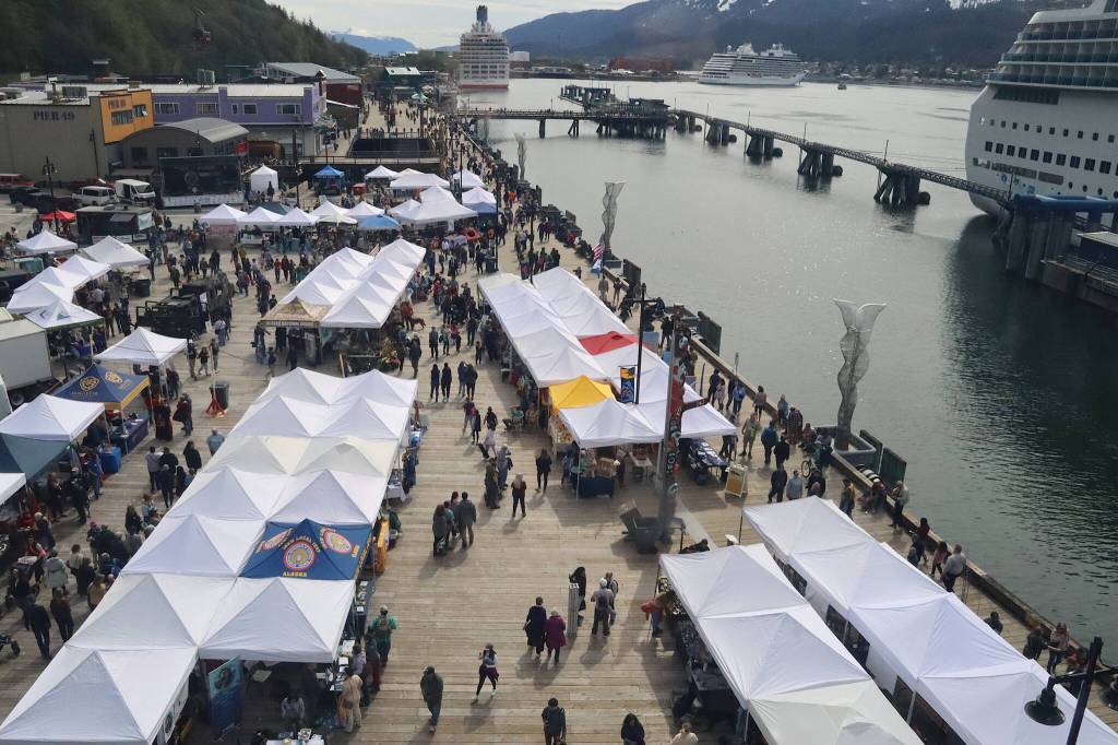 Hundreds of residents and cruise ship passengers visit the Juneau Maritime Festival at Elizabeth Peratrovich Plaza on Saturday. (Mark Sabbatini / Juneau Empire)