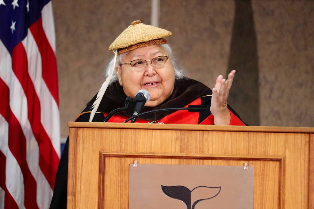 Della Sdaahlkawaás Cheney offers thanks after receiving an honorary doctorate of fine arts during the University of Alaska Southeast commencement ceremony on Sunday. (Mark Sabbatini / Juneau Empire)