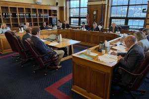 Members of the Alaska House Finance Committee discuss their first-draft budget on Tuesday, March 12. (James Brooks/Alaska Beacon)