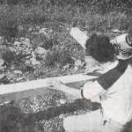 A photo from the dioceses November 1982 Inside Passage newsletter shows volunteers carving the date of installation onto the replacement cross they carried up the Mount Roberts Trail. (Photo courtesy Archdiocese of Anchorage-Juneau Archives)