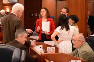 Members of the Alaska House of Representatives consider artificial intelligence legislation on Wednesday during a break in a session of the Alaska House of Representatives. (James Brooks/Alaska Beacon)