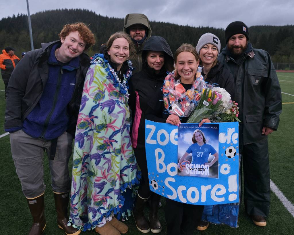 Thunder Mountain High School senior Zoey Moore and family and friends during the Falcons final home game Monday at Falcons Field. (Klas Stolpe / For the Juneau Empire)