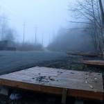 Scattered debris remains on a tent platform at the former Mill Campground on March 28, where people experiencing homelessness stayed during recent summers. Officials decided not to open the campground there this summer due to a high amount of illegal activity last year. (Mark Sabbatini / Juneau Empire file photo)