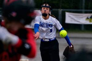Thunder Mountain High School senior pitcher Ashlyn Gates delivers a pitch during the Falcons 10-9 win over the Juneau-Douglas High School: Yadaa.at Kalé Crimson Bears on Tuesday at Dimond Park Fields. (Klas Stolpe, For the Juneau Empire)