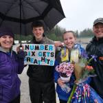 Thunder Mountain High School softball senior Jenna Dobson and family during Falcons senior appreciation Tuesday at Dimond Park Fields. (Klas Stolpe, For the Juneau Empire)