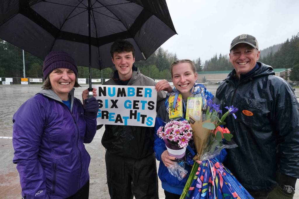 Thunder Mountain High School softball senior Jenna Dobson and family during Falcons senior appreciation Tuesday at Dimond Park Fields. (Klas Stolpe, For the Juneau Empire)