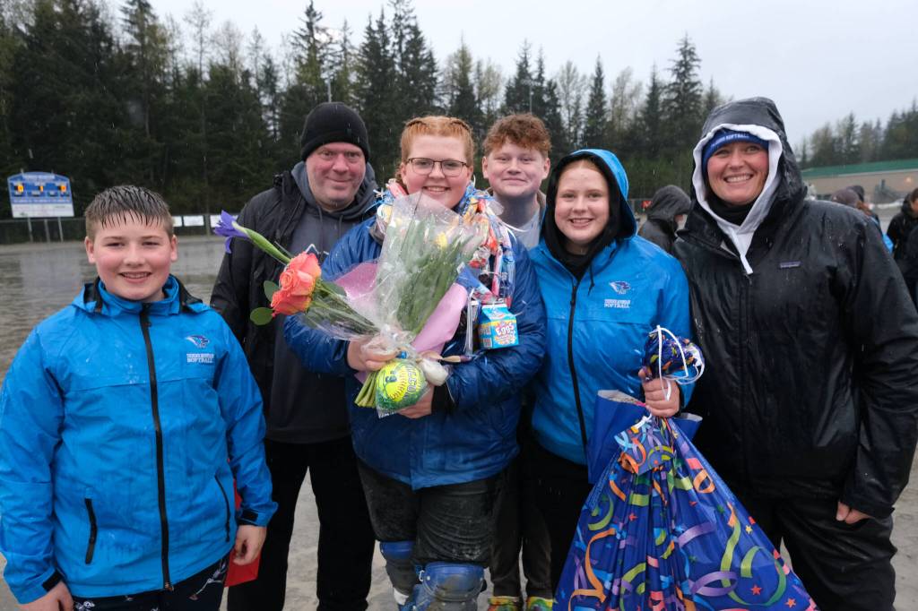 Thunder Mountain High School softball senior Kara Strong and family during Falcons senior appreciation Tuesday at Dimond Park Fields. (Klas Stolpe, for the Juneau Empire)