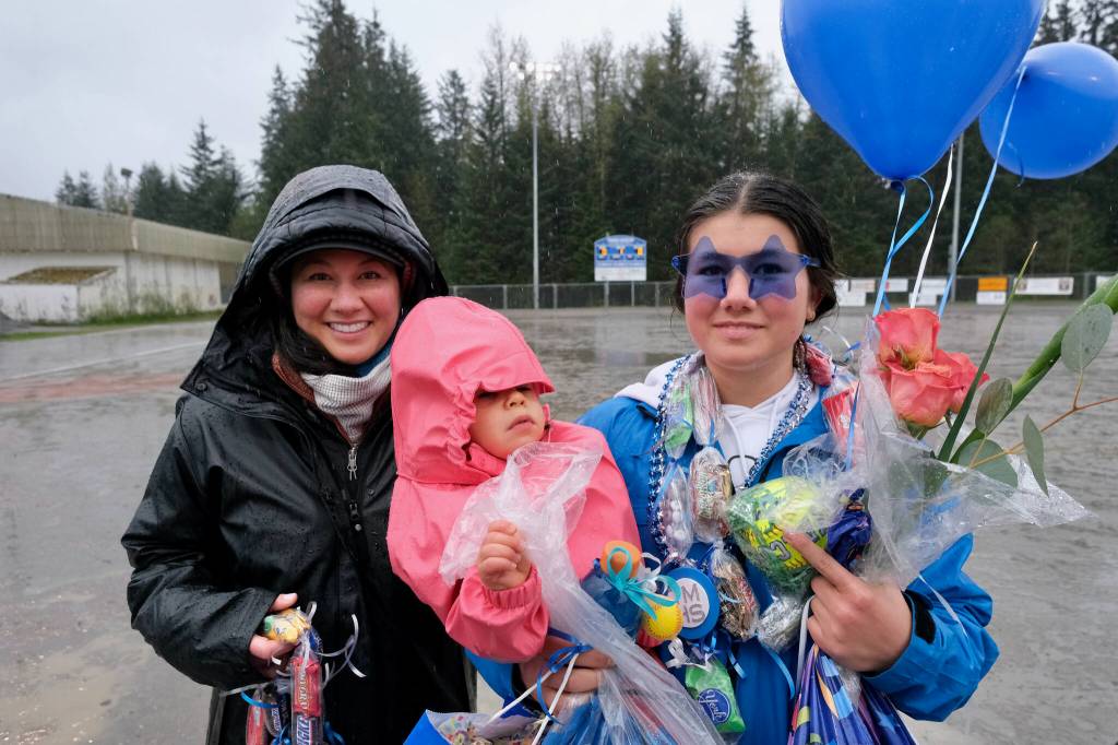 Thunder Mountain High School softball senior Aliza Mesdag and family during Falcons senior appreciation Tuesday at Dimond Park Fields. (Klas Stolpe, For the Juneau Empire)