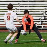 Juneau-Douglas High School: Yadaa.at Kalé goalkeeper Alex Mallott stops a shot by Ketchikans Joe Larson (9) during the Crimson Bears 4-2 win over the Kings at the Adair Kennedy pitch on Friday. (Klas Stolpe / For the Juneau Empire)