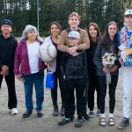 Thunder Mountain High School senior Kasen Ludeman and family and friends during the Falcons senior appreciation on Friday at Adair-Kennedy Field. (Klas Stolpe / For the Juneau Empire)