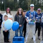 Thunder Mountain High School senior Liam Hart and family and friends during the Falcons senior appreciation on Friday at Adair-Kennedy Field. (Klas Stolpe / For the Juneau Empire)