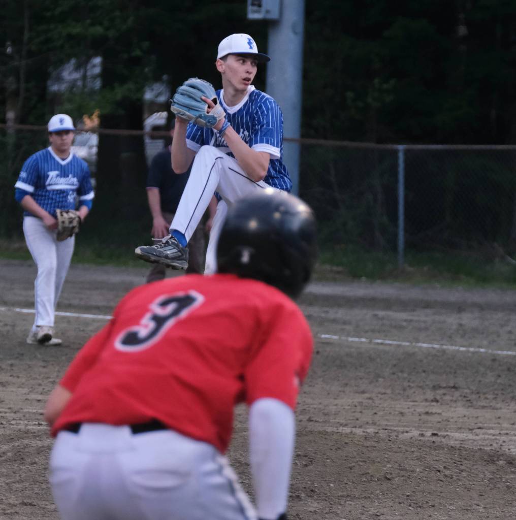 Thunder Mountain High School pitcher Kasen Ludeman delivers against Juneau-Douglas High School: Yadaa.at Kalé. (Klas Stolpe / For the Juneau Empire)