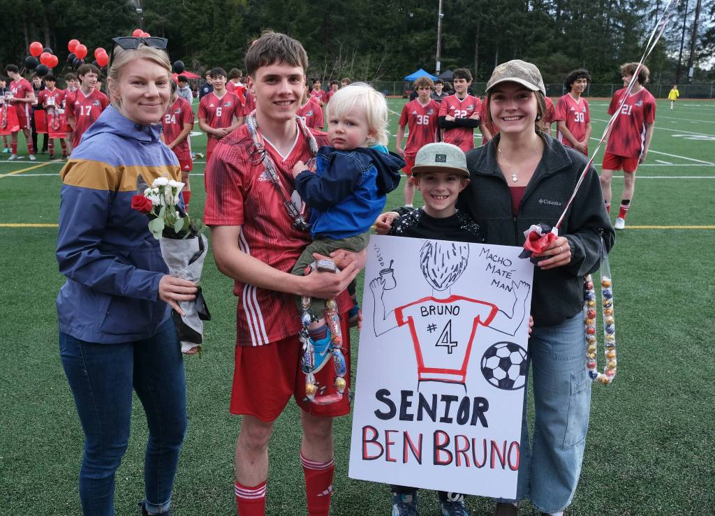 Juneau-Douglas High School: Yadaa.at Kalé senior Ben Bruno and family at Adair-Kennedy pitch on Saturday.(Klas Stolpe / For the Juneau Empire)