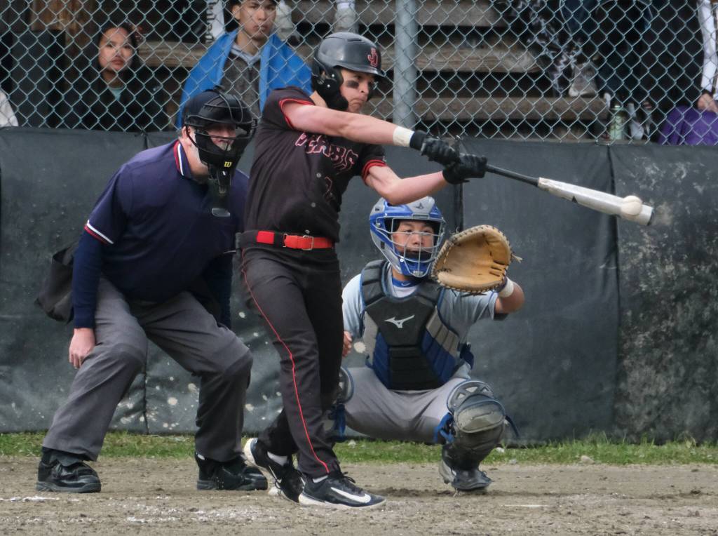 Juneau-Douglas High School: Yadaa.at Kalé sophomore Riley Fick connects on a pitch against Thunder Mountain during the Crimson Bears 3-0 win over the Falcons at Adair-Kennedy Field on Saturday. (Klas Stolpe / For the Juneau Empire)