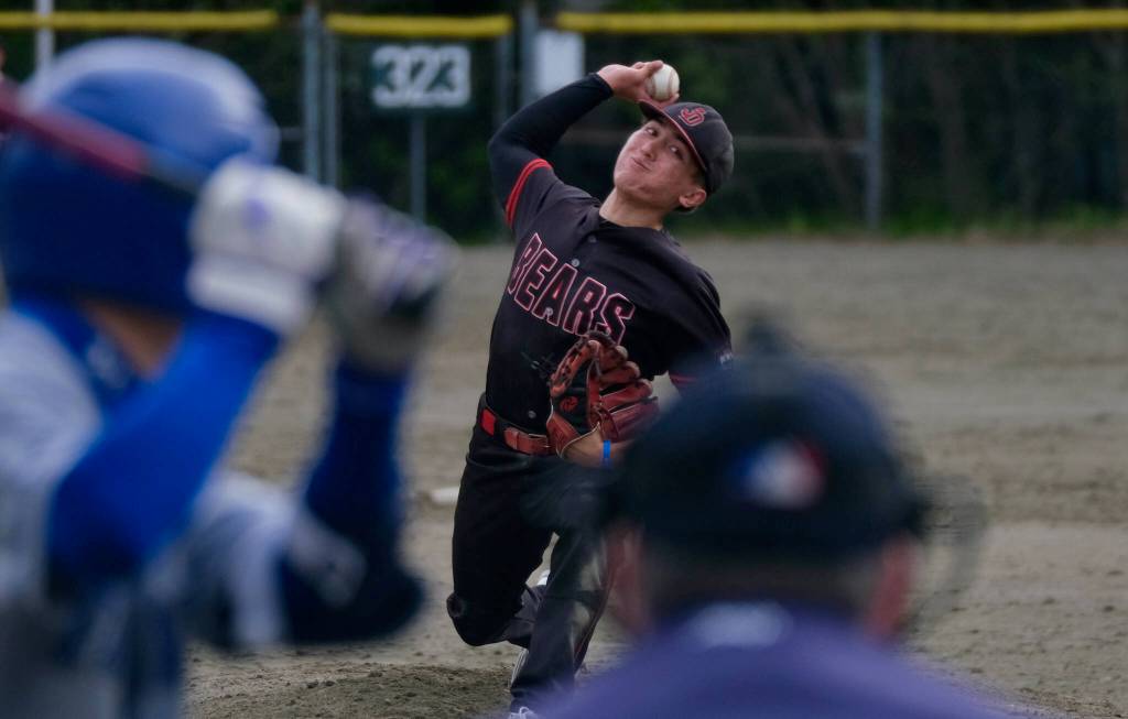Juneau-Douglas High School: Yadaa.at Kalé senior Lamar Blatnick pitches to a Thunder Mountain High school batter during the Crimson Bears 3-0 win over the Falcons at Adair-Kennedy Field on Saturday. (Klas Stolpe / For the Juneau Empire)