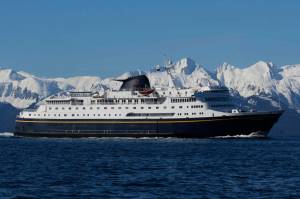 The Columbia state ferry sails through Lynn Canal on Monday, April 29, 2019. (Alex McCarthy / Juneau Empire file photo)