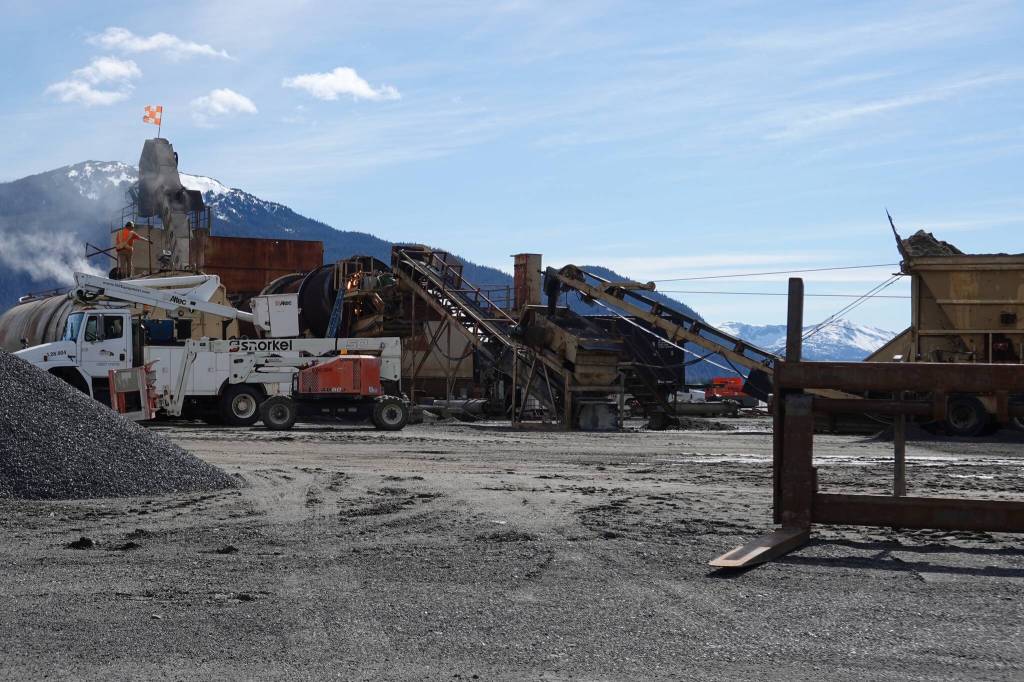 A temporary asphalt batch plant located at the east end of the Juneau International Airport is permitted to operate April through October until 2026 to replace pavement surrounding the airport terminal and some secure aircraft parking areas. Discreet phases are scheduled to minimize disruption of airport operations. (Laurie Craig / Juneau Empire)