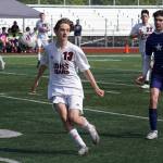 Juneau-Douglas High School: Yadaa.at Kalés Xavier Melancon moves with the ball during the ASAA Soccer Division II State Championships at Veterans Memorial Field in Wasilla on Saturday, May 25. (Jake Dye/Peninsula Clarion)