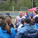 Thunder Mountain High School players and coaches celebrate after winning the Region V softball championship game against Sitka High School on Saturday at Melvin Park. (Mark Sabbatini / Juneau Empire)