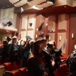 Newly graduated students at Yaaḵoosgé Daakahídi High School toss their caps in the air following Sundays commencement ceremony in the Juneau-Douglas High School: Yadaa.at Kalé auditorium. (Mark Sabbatini / Juneau Empire)