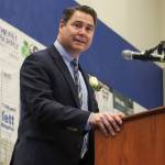 Thunder Mountain High School Principal Shawn Arnold recognizes graduating students during Sundays commencement ceremony. (Jasz Garrett / Juneau Empire)