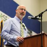 Thunder Mountain High School social studies teacher Jamie Marks gives a speech at Sundays commencement ceremony. (Jasz Garrett/ Juneau Empire)
