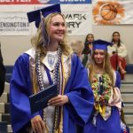 Thunder Mountain High School graduate Lacie Gehring with her diploma during Sundays commencement ceremony. (Jasz Garrett /Juneau Empire)