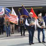 A color guard of Southeast Alaska Native Veterans carries flags to the Southeast Alaska Native Veterans Memorial Park during a Memorial Day ceremony on Monday. (Mark Sabbatini / Juneau Empire)